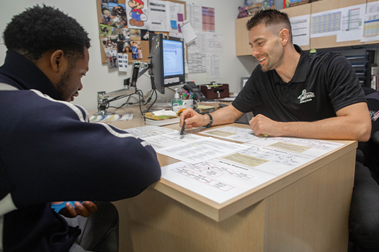 Norco College Counselor Jethro Midgett with student