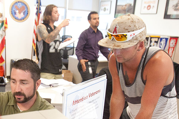 Norco College veteran student receiving help from counselor at Veterans Resource Center