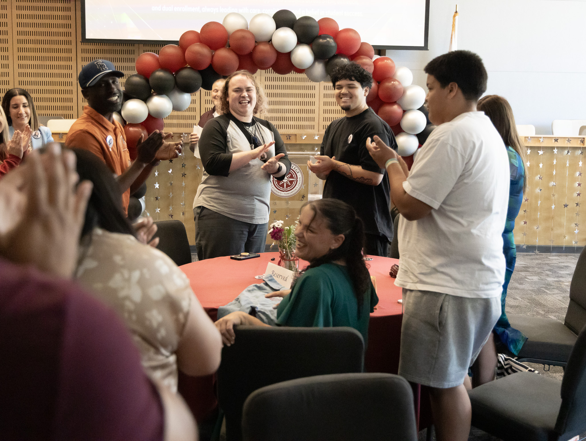 Family, friends, colleagues, and campus leadership taking a moment to celebrate Kasey Boyer at the 2026 Classified Professional of the Year celebration.