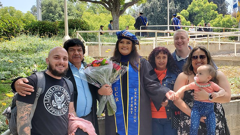 Brenda Lopez Reyna with her family that supported her through her academic journey.