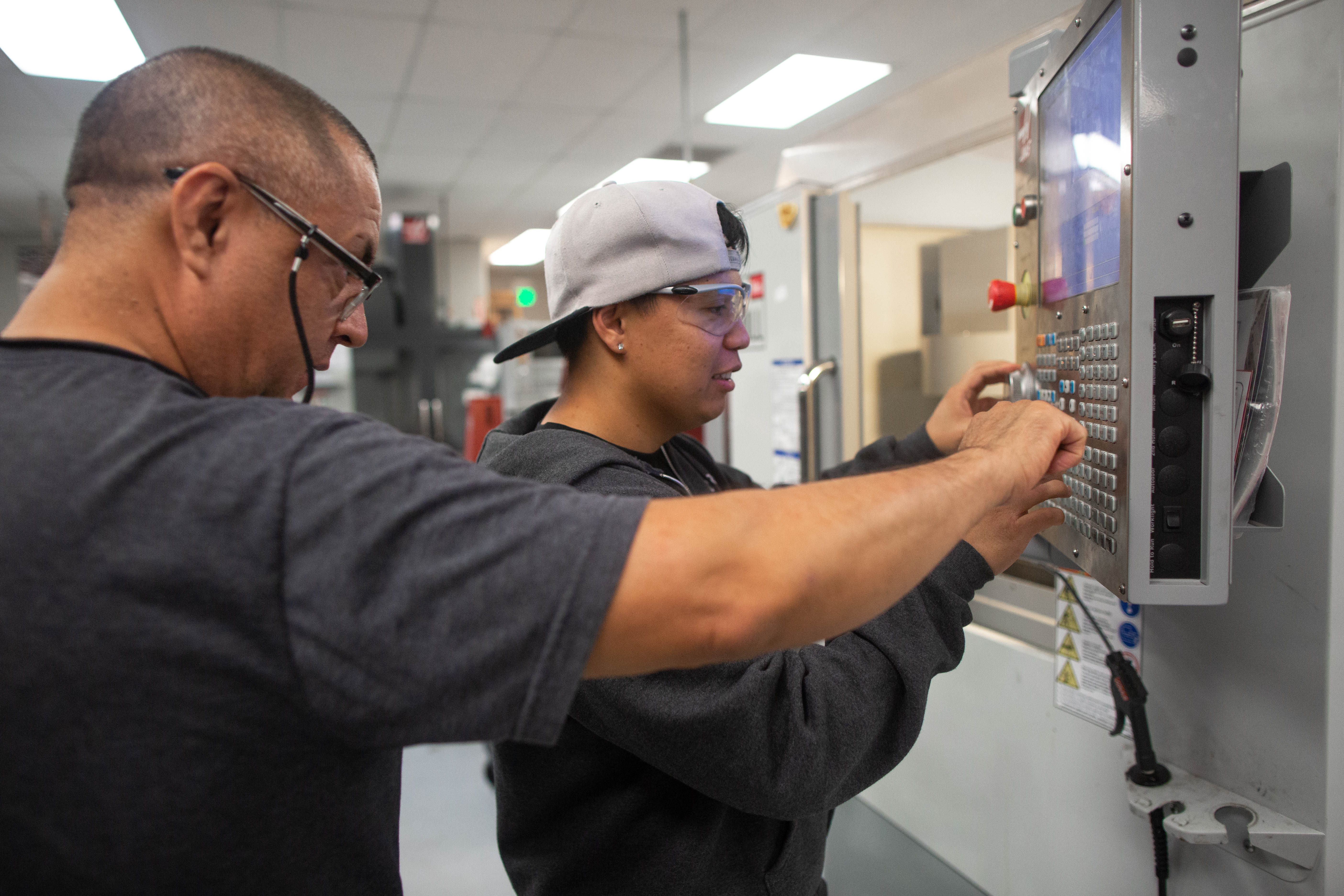 Norco College student and instructor in Manufacturing class