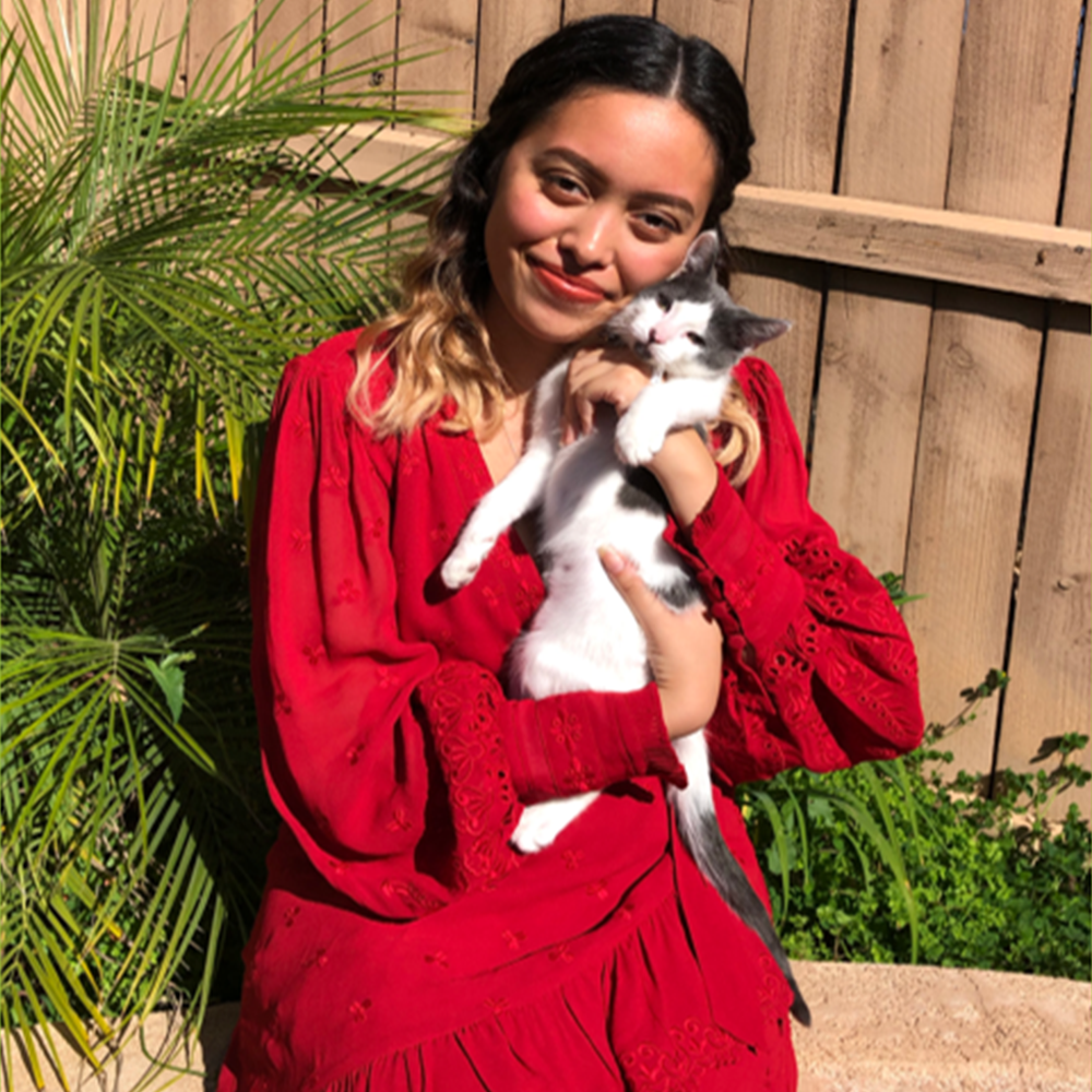 CalWORKs Norco College alumni and former CalWORKs recipient Sarah Gadalla holding her cat